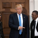 In this November 2016 photo, Donald Trump greets Robert Johnson (right), the founder of BET, and NFL executive Traci Otey Blunt as they arrive for a meeting with Trump at his Bedminster Township, N.J., golf club following Trump’s presidential election win.
